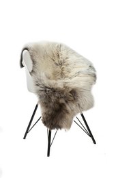 Soft, plush multicolor sheepskin throw blanket measuring 90-110cm, perfect for cozy comfort and adding texture to any room.