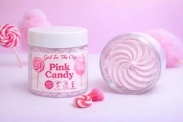  Pink swirled body butter with candy lollipop design, creamy texture, moisturizing skincare product.