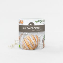 Organic onion bread made from potato dough, with a golden-brown crust and a soft, fluffy interior.