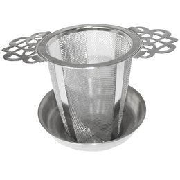 Stainless steel tea strainer with drip tray, tall and durable design for loose leaf tea brewing.
