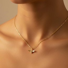  A delicate gold-toned necklace with a small bee pendant, perfect for adding a touch of nature-inspired style to any outfit.