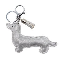  Silver glitter dachshund keychain with tassel charm.
