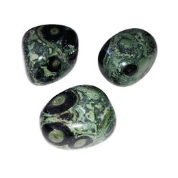 Kambamba jasper tumbled stone, a natural crystal with a green and black color pattern, featuring an irregular, rounded shape.