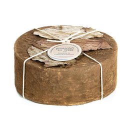  A round, brown cheese wheel labeled "La Mucca al Castagno (cow milk) 0.5 kg" in the category of cheese.