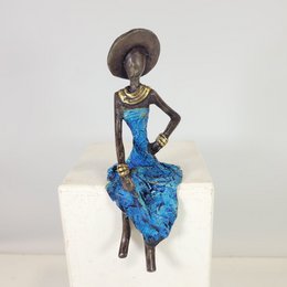 Bronze-Skulptur "Femme assise avec chapeau" by Soré | verschiedene Größen und Farben