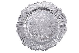 Silver flower-shaped placemat, round, decorative, for table setting.