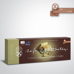 Nougat with tangerine and white truffle yuzu, a premium chocolate bar with a blend of citrus and creamy flavors.