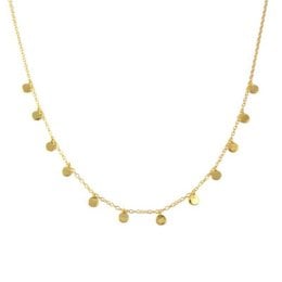 A delicate gold necklace with a row of small, round charms hanging from the chain. The charms have a shiny, polished finish that catches the light beautifully.