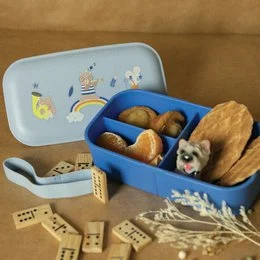 A colorful, animal-themed snack box with a variety of snacks and a matching water bottle. The box features illustrations of animals and rainbows, indicating a fun, playful design targeted towards children.