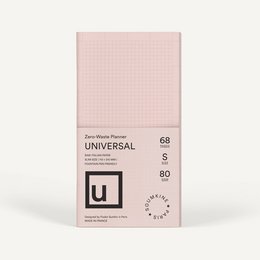 A rose-colored, zero-waste planner with a grid pattern design. Made of sustainable materials.