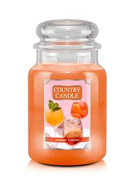 Large scented candle with a citrus and floral fragrance. Features a round, tall glass jar design.