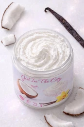  Vanilla coconut body butter, creamy white texture, tropical scent, moisturizing skincare product.