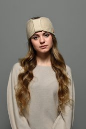 "Soft, cozy cashmere headband in a variety of neutral colors. Features a stylish bow detail. Perfect for keeping warm and adding a touch of elegance to any outfit."