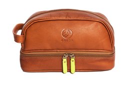 Cognac yellow toiletry bag with multiple compartments, suitable for weekend travel.