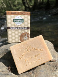 Organic goat milk and honey soap with vanilla coconut scent. Rectangular bar shape.