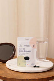 Weight loss complex capsules in a white package with green and white design. Contains natural ingredients like artichoke and green tea to support weight management.