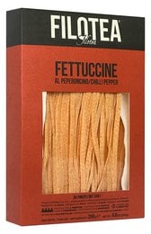 Fettuccine al Peperoncino 250 gr. - Pasta product featuring long, flat noodles in a vibrant orange color.
