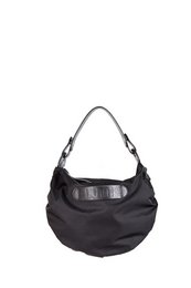 A black shoulder bag with a simple, minimalist design. The bag features a single strap and a zippered main compartment.