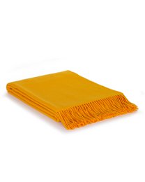  Soft, cozy throw blanket in a warm sunset color palette with a textured woven pattern and fringe trim.