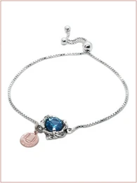 Elegant cuff bracelet with a vibrant gemstone in a silver-tone setting, available in multiple color options.