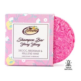 Pink shampoo bar with ylang ylang scent, suitable for all hair types.