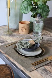 Rectangular natural-colored washable paper placemat, 37x44 cm in size, suitable for everyday use or special occasions.