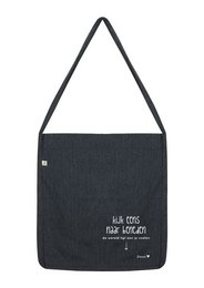 A black shoulder bag with the text "Look down the world is at your feet" printed on it. The bag appears to be made of a durable, textured material and has a simple, minimalist design.