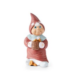 A decorative figurine of a smiling gnome or elf-like character wearing a red hat and holding a wicker basket.