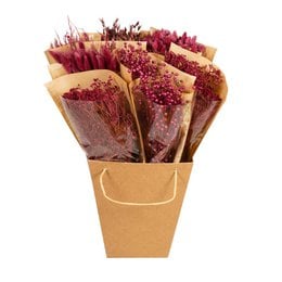 Dried burgundy-colored flowers in a paper wrap, featuring a mix of textures and shades of red.