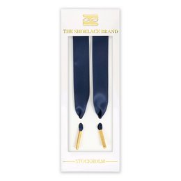  Navy blue silk shoelaces with gold-tone aglets.