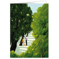 COUPLE KISSING AT THE PARK