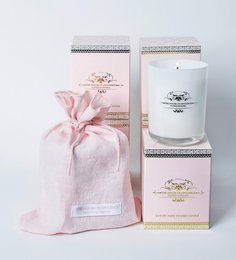 A tall, round, white scented candle with a pink ribbon and floral design on the packaging. The candle is described as "Flower Euphoria" and is part of the "Scented Candles" category.