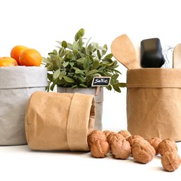 Grey washable paper bag with dimensions 13 x 13 cm, 15 x 15 cm, 20 x 20 cm, Ø20/H10 cm, Ø25/H10 cm. Made of durable paper material, suitable for storing and transporting various items.