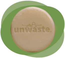 Solid shampoo bar with coffee oil, suitable for all hair types.