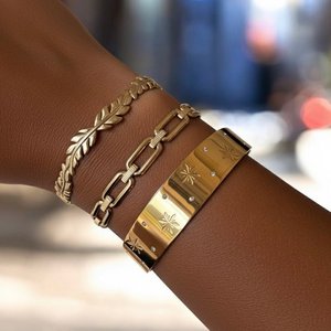 STELLAR GLOW - Rigid Bracelet with Stars in gold-plated steel