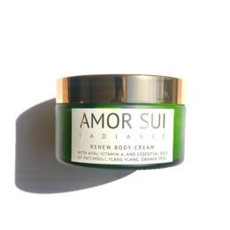 Radiance body cream with a green and gold jar, featuring the brand name "Amor Sui" on the label.