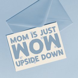  "Mother's Day card with 'Mom is just wow upside down' text, blue envelope, greeting card"