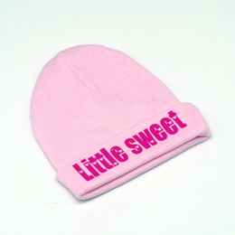 Pink baby hat with "Little Sweet" text