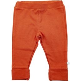 Red baby leggings with polka dot pattern. Soft, stretchy material for comfort and ease of movement.