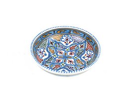 Decorative ceramic bowl in vibrant blue, orange, and white colors with a floral and geometric pattern.