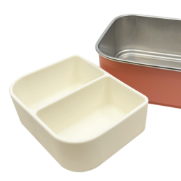  Rectangular silicone lunch box with two compartments for storing different food items.