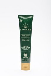 Organic hemp face cream in a 40ml tube. Green and gold packaging. Moisturizing and nourishing formula for skin.