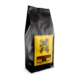 A 500g or 1kg bag of Leeuw van Vlaanderen coffee. The bag has a yellow and black design with a lion graphic, indicating it is a coffee product from the Flanders region.