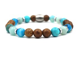  Beaded bracelet with natural stones in various shades of brown, including round beads in different sizes.