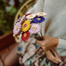 A bouquet of colorful artificial gerbera daisies with stems approximately 39cm long. The flowers come in a variety of colors including yellow, dark blue, light blue, purple, pink, red, and white.