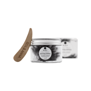 Zahnpulver im Glasgefäß