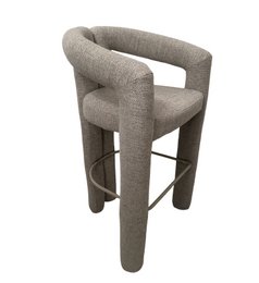 Beige upholstered bar stool with curved backrest and wooden legs. Suitable for use in a bar or kitchen counter.