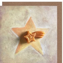 Star-shaped soap with textured surface, suitable for gift cards or decorative purposes.