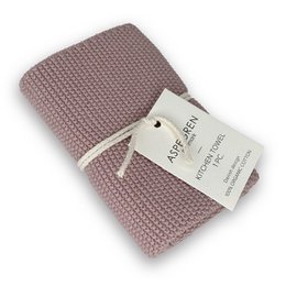  Pale mauve kitchen towel made of soft, absorbent material.