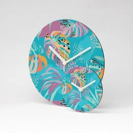 This round wall clock features a multicolored tropical floral design with vibrant colors and patterns. The clock has a diameter of 13cm and is made of MDF material.